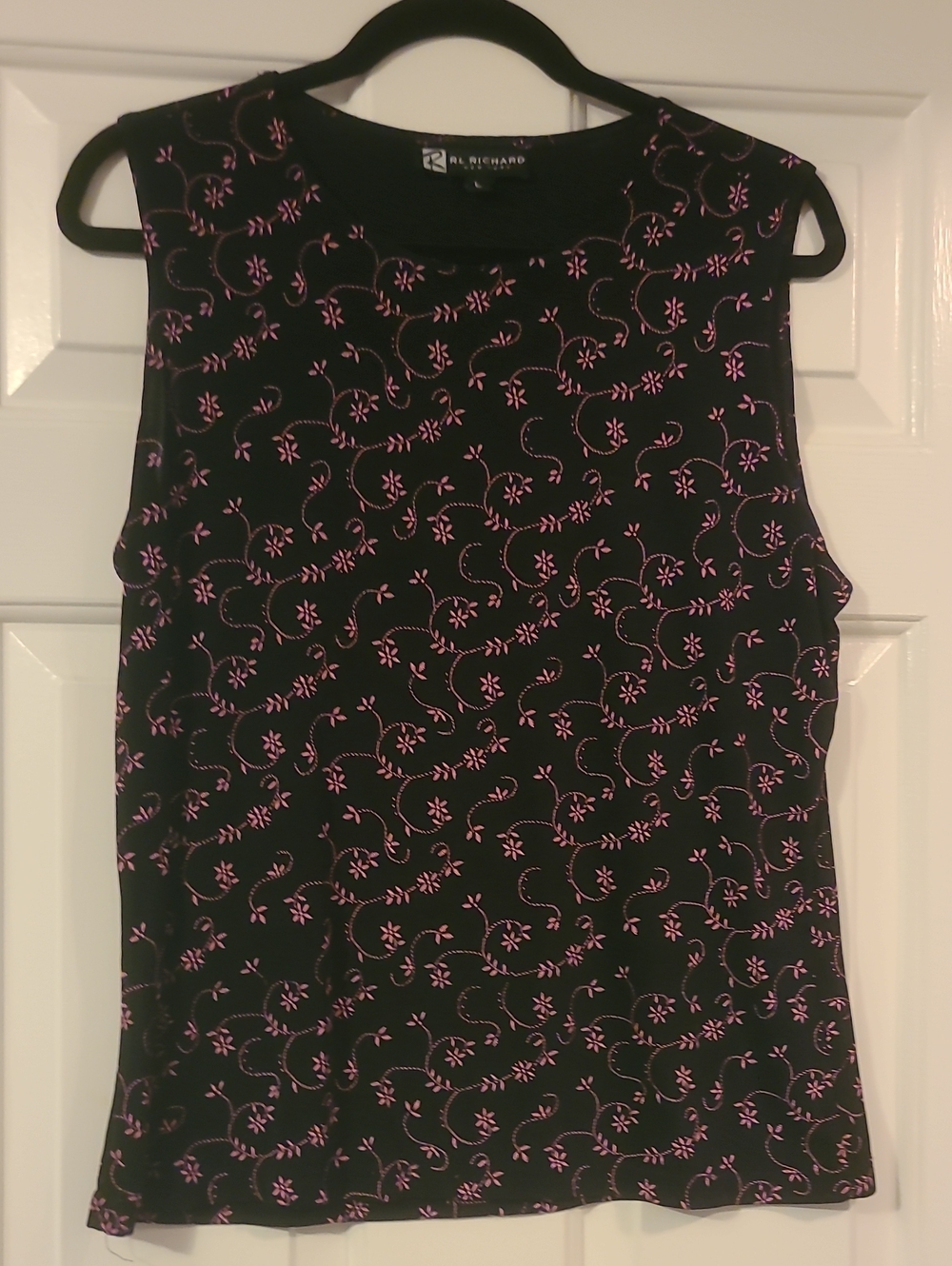 Black Sleeveless Blouse with Pink Floral Motif